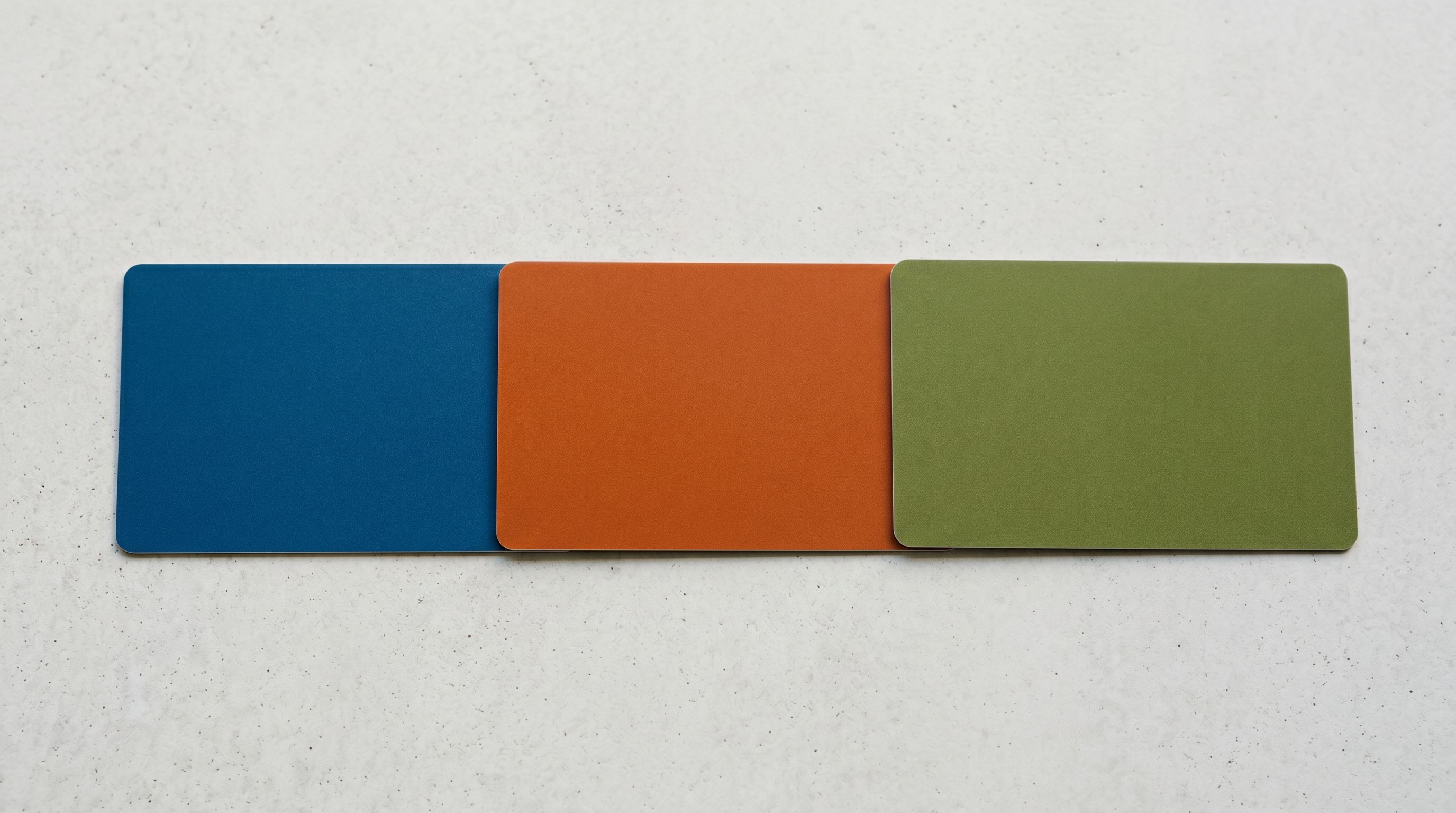 Three printed licence agreement cards laid out in a row on a flat surface, each representing different tier options for a digital product.